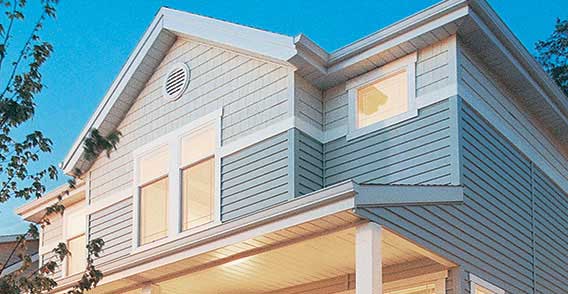 A house with blue siding and white trim.